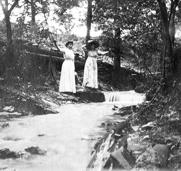 Laura on the left and Rose on the right standing in the ravine at Rocky Ridge Farm. Courtesy Herbert Hoover Presidential Library.